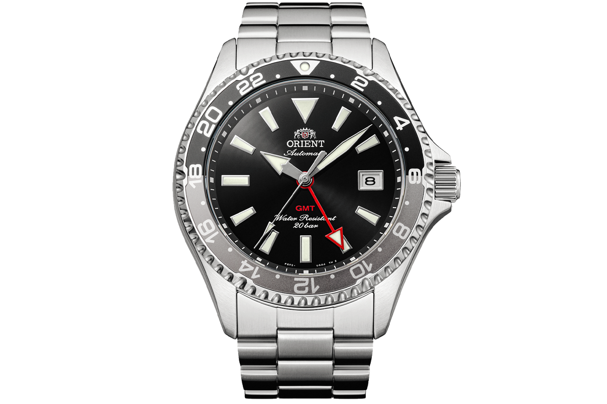 Orient RA-BC0001B Kamsu GMT watch with a black sunburst dial, black-and-gray 24-hour bezel, date window, and stainless steel bracelet
