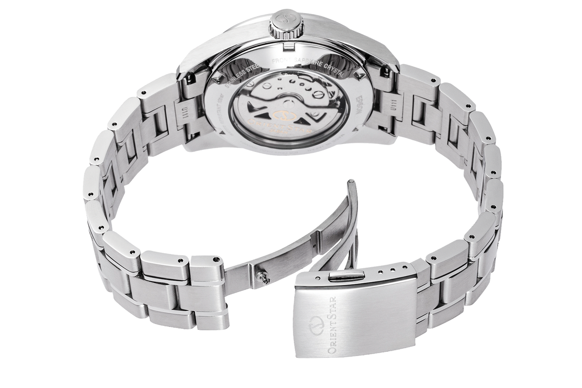 The back view of a stainless steel wristwatch with a multi-link bracelet and a visible automatic mechanical movement, featuring a polished clasp engraved with the Orient Star logo.

Orient Star RE-AU0107E