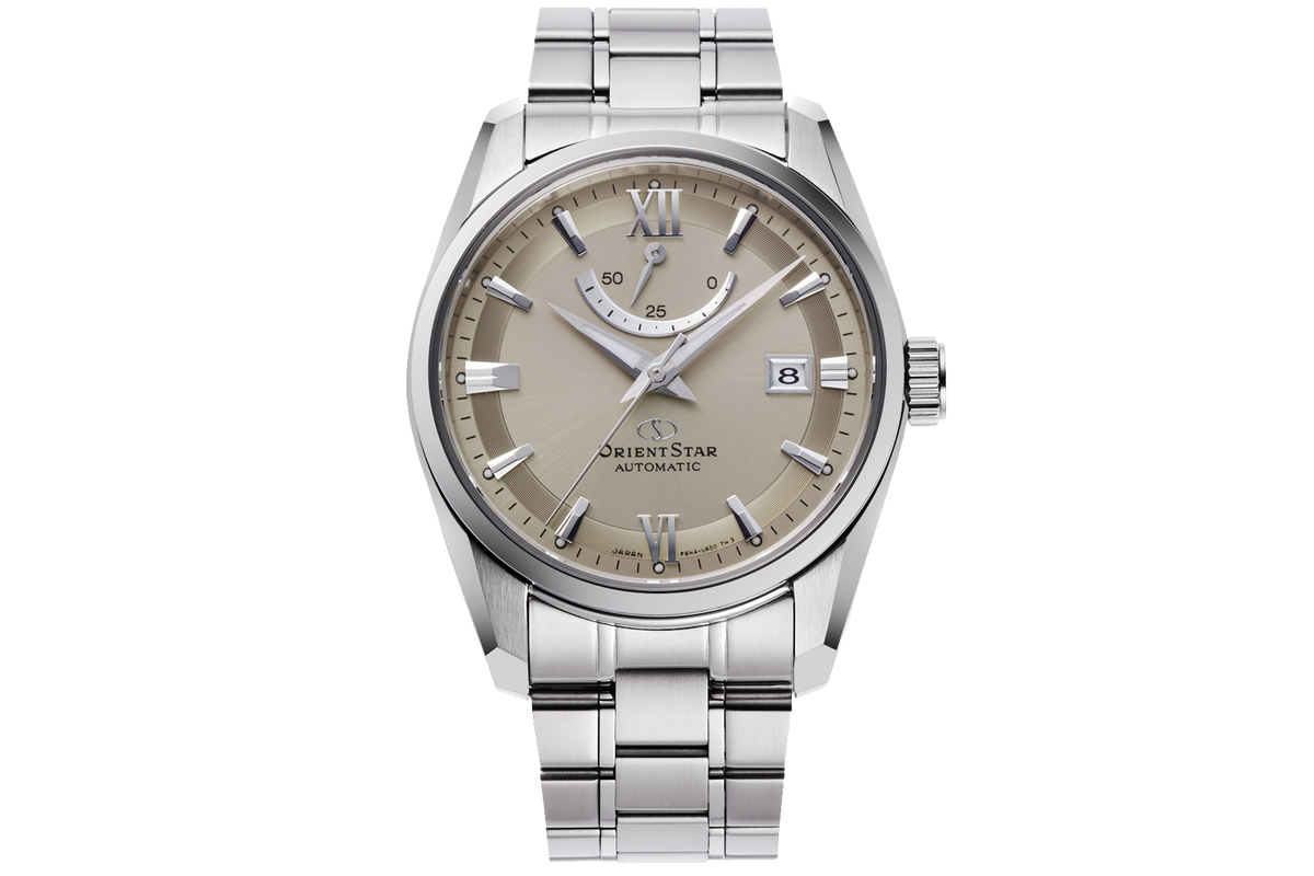 An Orient Star Automatic watch with a silver stainless steel link bracelet and a champagne beige dial, shown against a solid white background.

Orient Star RE-AU0110N