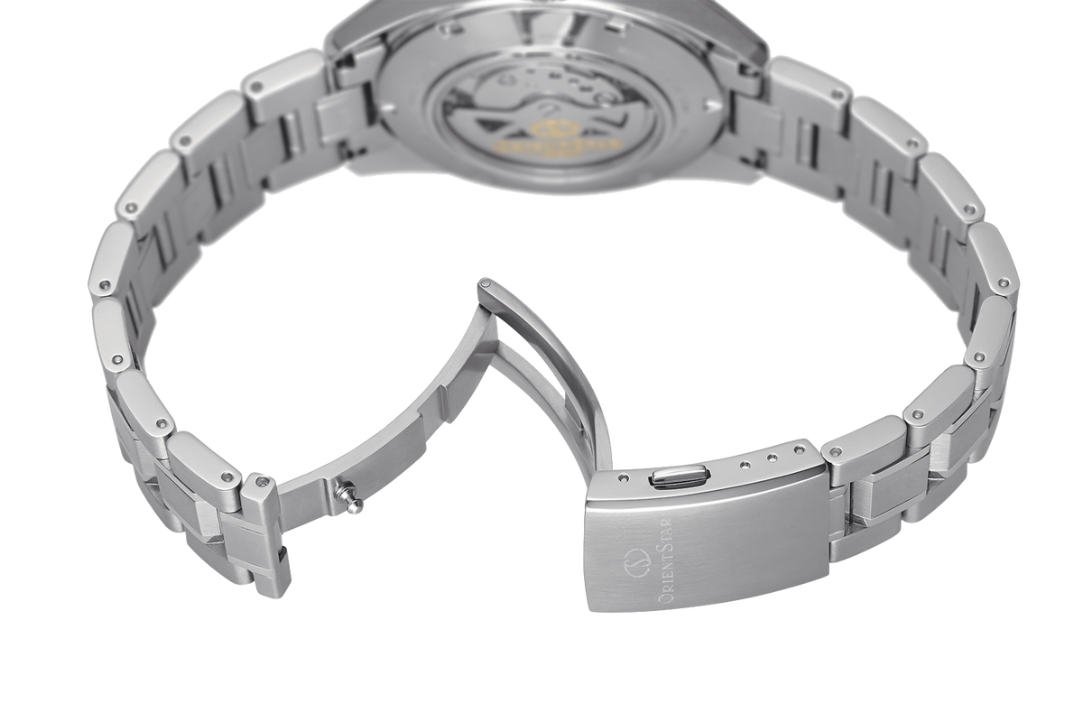 Close-up rear view of a stainless steel watch with a metal link bracelet and a folding clasp, photographed on a clean white background.

Orient Star RE-AV0003L